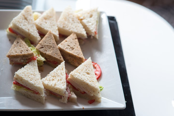 Hotel Coffee break  cold cut platter ham cheese sandwich triangles