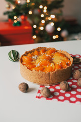 Peach and mandarine cheesecake with decorations
