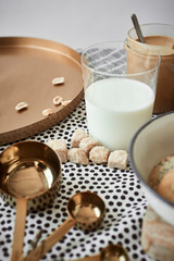 Glass of milk, cookies and sugar