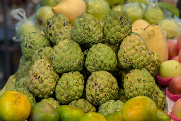 Obraz premium Pile of custard apple in market