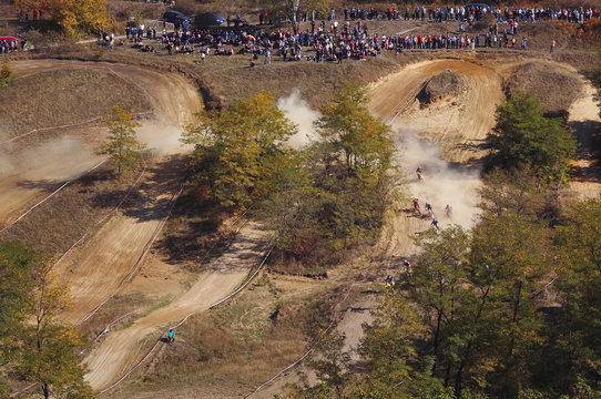 Snake trail.  Motocross competition. Complicated route in plan and spectator. Suporter. Mutch dust.