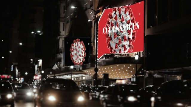 COVID-19 Billboard on a Theater in Corrientes Avenue at Night, Buenos Aires, Argentina. 