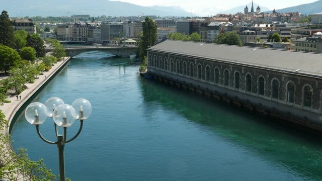 Rhone River passing under Coulouvreniere bridge after Leman lake