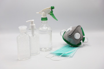 Coronavirus prevention medical surgical masks and hand sanitizer gel for hand hygiene corona virus protection.
