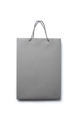 Gray paper shopping bag isolated on white background