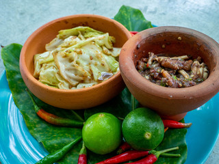 Nam Prik Kapi (Spicy shrimp paste), a popular Thai food served with stir-fried colorful vegetables.