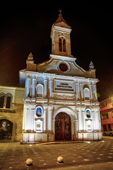Cuenca, Ecuador, November 2013: La Merced church, or Mercy Church, illuminated at night time, with it's colonial style and decorations.