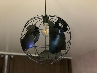 Beautiful chandelier is the main element of decor in the loft style