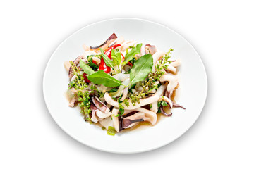 Stir fried squid with basil isolated on white backgroud. thai food. with clipping path.