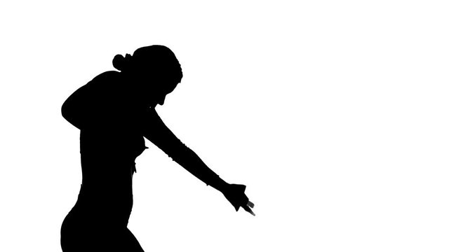 Medium long shot of young beautiful girl dancing contemporary, modern ballet dance, black silhouette on a white background