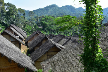 Fototapeta na wymiar wooden house in the mountains. Traditional house of Baduy people. isolated village in Indonesia