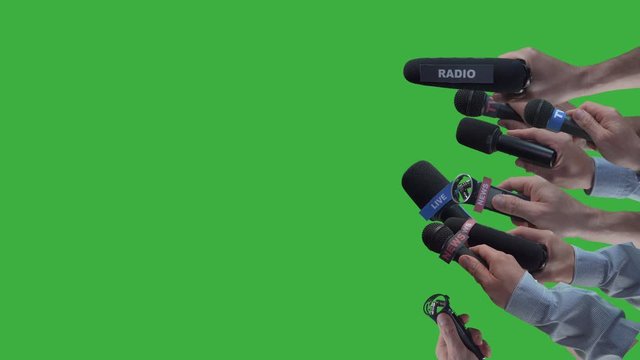 Reporters Interview With Microphones On Green Screen,celebrity journalism