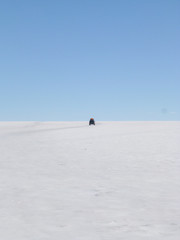 A car at Lake Salar de Uyuni, Bolivia