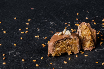 Obraz premium Homemade belgian chocolate. Close-up chocolate. Religious Holiday, The Sugar Feast After Ramadan. Blurred background. Copy space for text message.