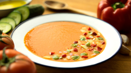 Traditional  spanish gazpacho, Cold tomato soup served with some vegetables.