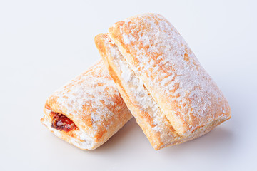 Gingerbread with berry jam on white background, isolated