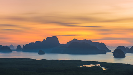 Fototapeta na wymiar Sunrise time at Samed Nang Chee mountain view point in Phang Nga Province