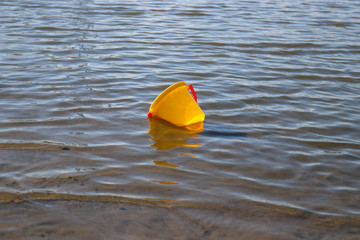 yellow toy in the water