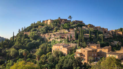 Fototapeta premium Scenic view of Deia, Majorca against blue sky.