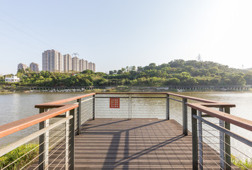 Landscape of urban reservoir Park and modern buildings in Xiamen city in China