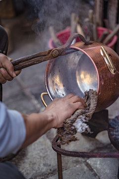 production of copper tableware in the Arab city