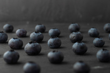 Blueberry seamless pattern on concrete background. 