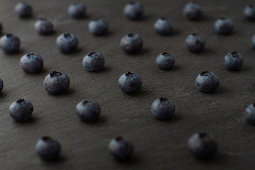 Blueberry seamless pattern on concrete background. 