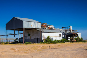 Fototapeta na wymiar Old Deserted Industrial Grain Processing Plant
