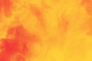 Abstract colorful smoke background.  Yellow and red texture of smoke. 
