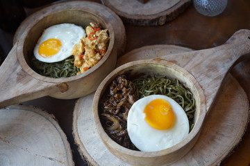 Green Noodle in a Wooden Bowl