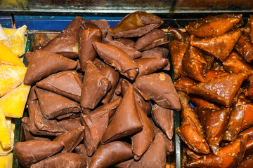 Turkish specific dessert with nuts walnuts and honey, pastry named fistikli muska.