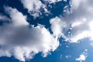Beautiful sky with volumetric clouds, and the rays of the sun.