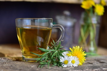 cup of tea with chamomile flowers