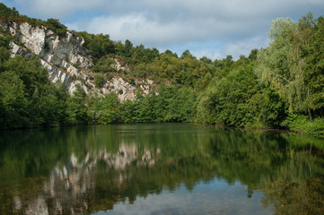 Lake in old quarry Mont Castre, Normandy France