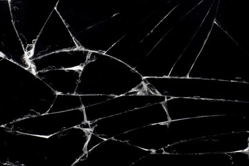 Broken black glass, with white lines on black glass.