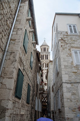 Fototapeta na wymiar Narrow street on a rainy day in Split, port city on the Dalmatian coast, on the Adriatic Sea, Croatia, Europe.