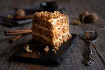 Piece of cake. Carrots and walnuts cake with creamy cheese