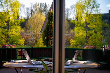 Home office in a balcony, reflection 