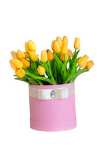 Pink box with yellow tulips on a white background.