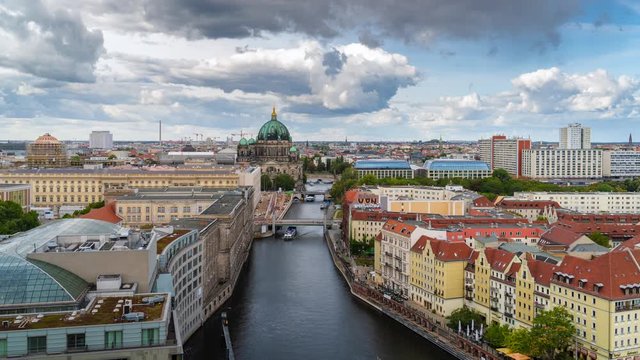 Berlin, Germany, time lapse view of tour boats on the Spree River including historial landmark Berlin Cathedral and Museum Island. 