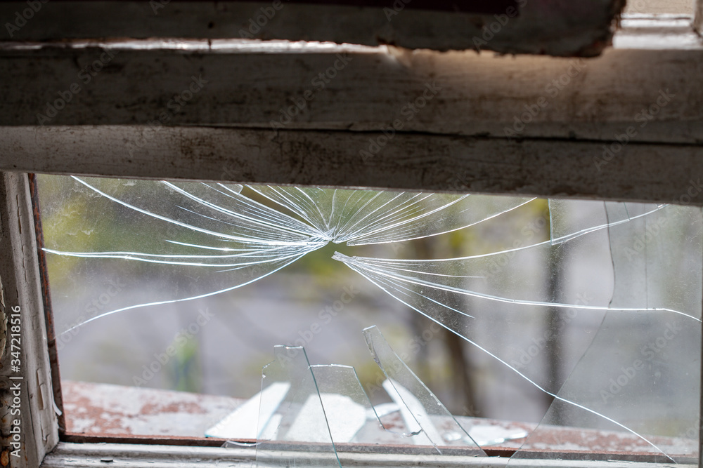 Poster broken window in a residential building