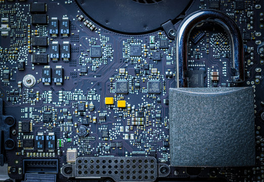 Data protecting Security Concept. Computer Internet protection with lock, key on microscheme chip. System Shield Protection Verification.