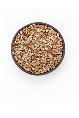 Cleaned  Pistachios  in round bowl on white background, top view