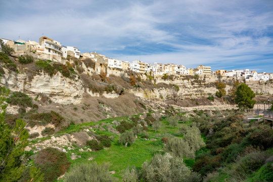 Residential buildings on the edgo of high rock in Sorbas, Spain, Almeria, Andalusia.
