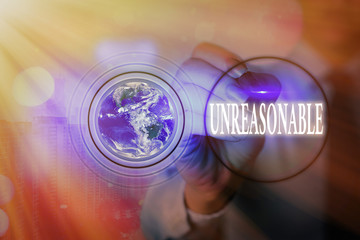 Writing note showing Unreasonable. Business concept for Beyond the limits of acceptability or...