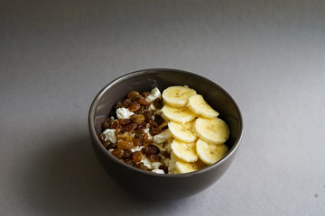bowl with banana and raisin
