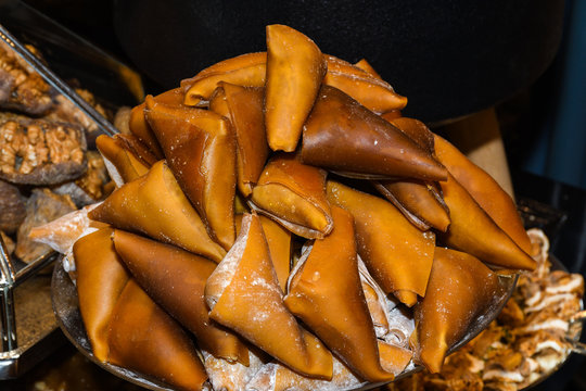 Turkish specific dessert with nuts walnuts and honey, pastry named fistikli muska.