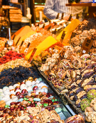 Counter with various dried fruits on the Grand Bazaar in Istanbul, Turkey
