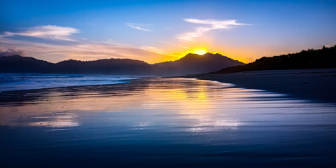
sunset on the beach of the red island