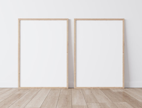 Set of 2 Wooden frames a3, a4, frame mock up on white wall standing on wooden floor. Poster mock up. minimal frames. Empty frame Indoor , 3D render, 3D illustration